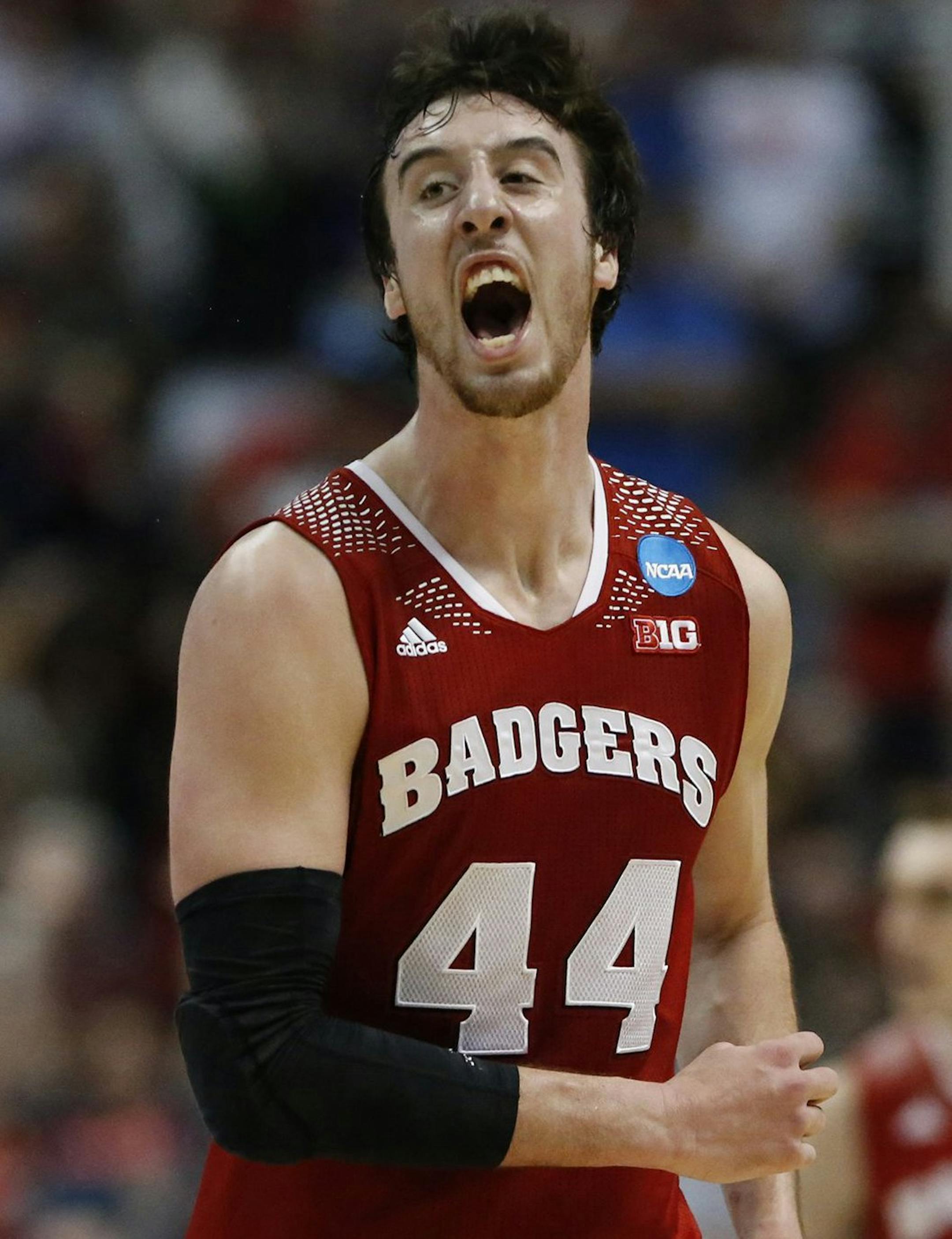 Wisconsin's Frank Kaminsky celebrates after hitting a shot late in the second half against Arizona in the NCAA Tournament's West Region final at the Honda Center in Anaheim, Calif., on Saturday, March 29, 2014. Wisconsin advanced, 64-63, in overtime. (Robert Gauthier/Los Angeles Times/MCT) ORG XMIT: 1151027