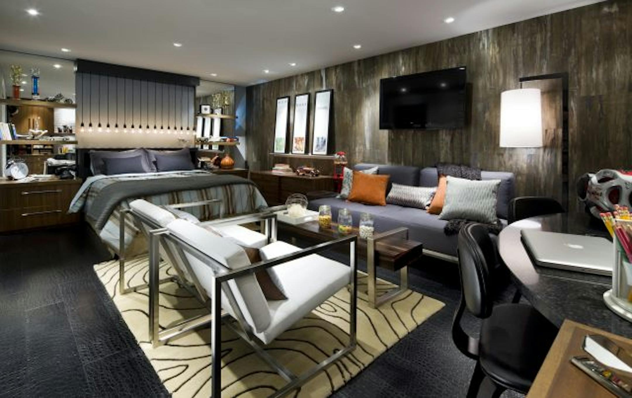 After: By using accents, funky furnishings and a handful of customized gadgets, this basement was turned into a retreat that is as unique as the teen who's moving in.