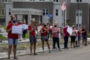 In August, Anoka-Hennepin teachers rallied ahead of a school board meeting at Sandburg Education Center in Anoka.