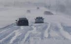 Per MNDOT, photo shows cars stuck in the snow on Hwy 14 in southeast Minnesota Sunday morning. credit: MNDOT 2/24/19