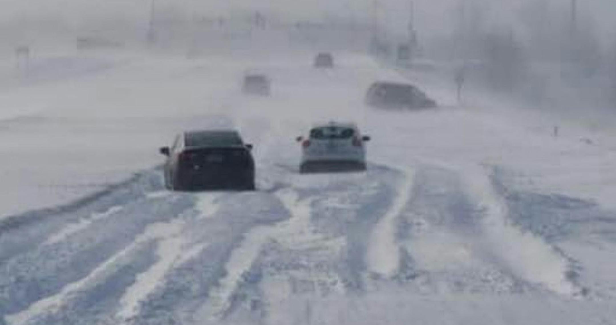 Per MNDOT, photo shows cars stuck in the snow on Hwy 14 in southeast Minnesota Sunday morning. credit: MNDOT 2/24/19