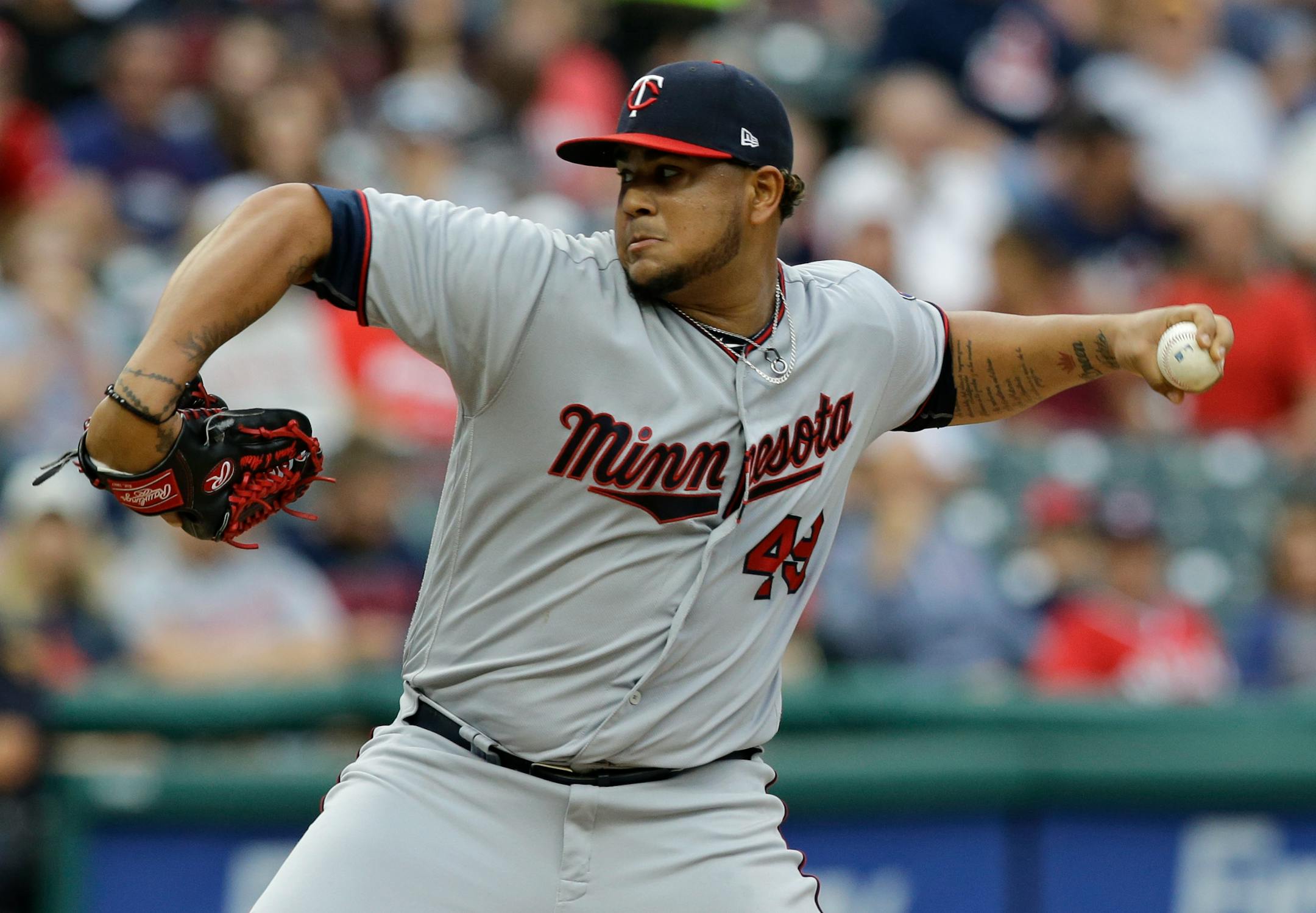 Minnesota Twins starting pitcher Adalberto Mejia delivers in the first inning of the team's baseball game against the Cleveland Indians, Friday, June 23, 2017, in Cleveland. (AP Photo/Tony Dejak)