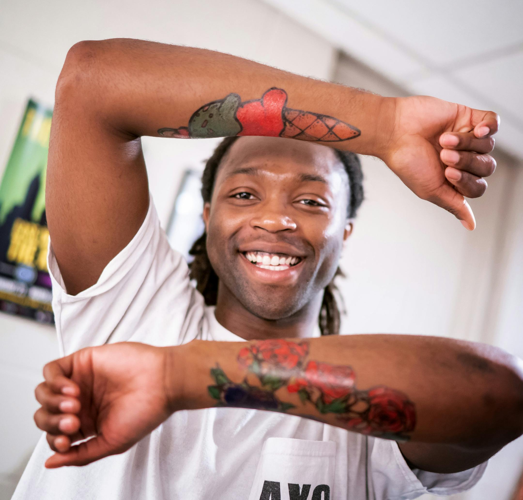 Dwight Leslie showed off his finished temporary tattoos for "Last Stop on Market Street" at the Children's Theatre.