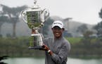 Collin Morikawa holds the Wanamaker Trophy after winning the PGA Championship at TPC Harding Park on Aug. 9