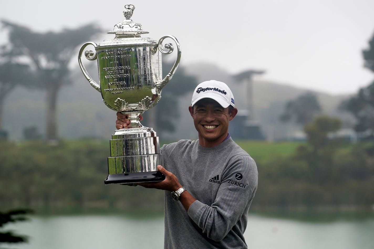 Collin Morikawa holds the Wanamaker Trophy after winning the PGA Championship at TPC Harding Park on Aug. 9