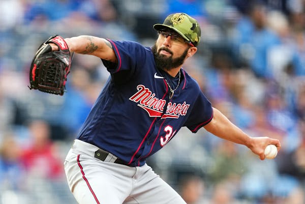 Devin Smeltzer of the Twins pitches against the Kansas City Royals during the first inning at Kauffman Stadium on Friday.