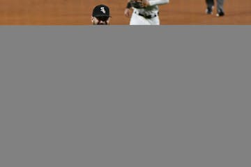 Chicago White Sox pitcher Lucas Giolito celebrates with catcher James McCann after closing out a no-hitter on Aug. 25