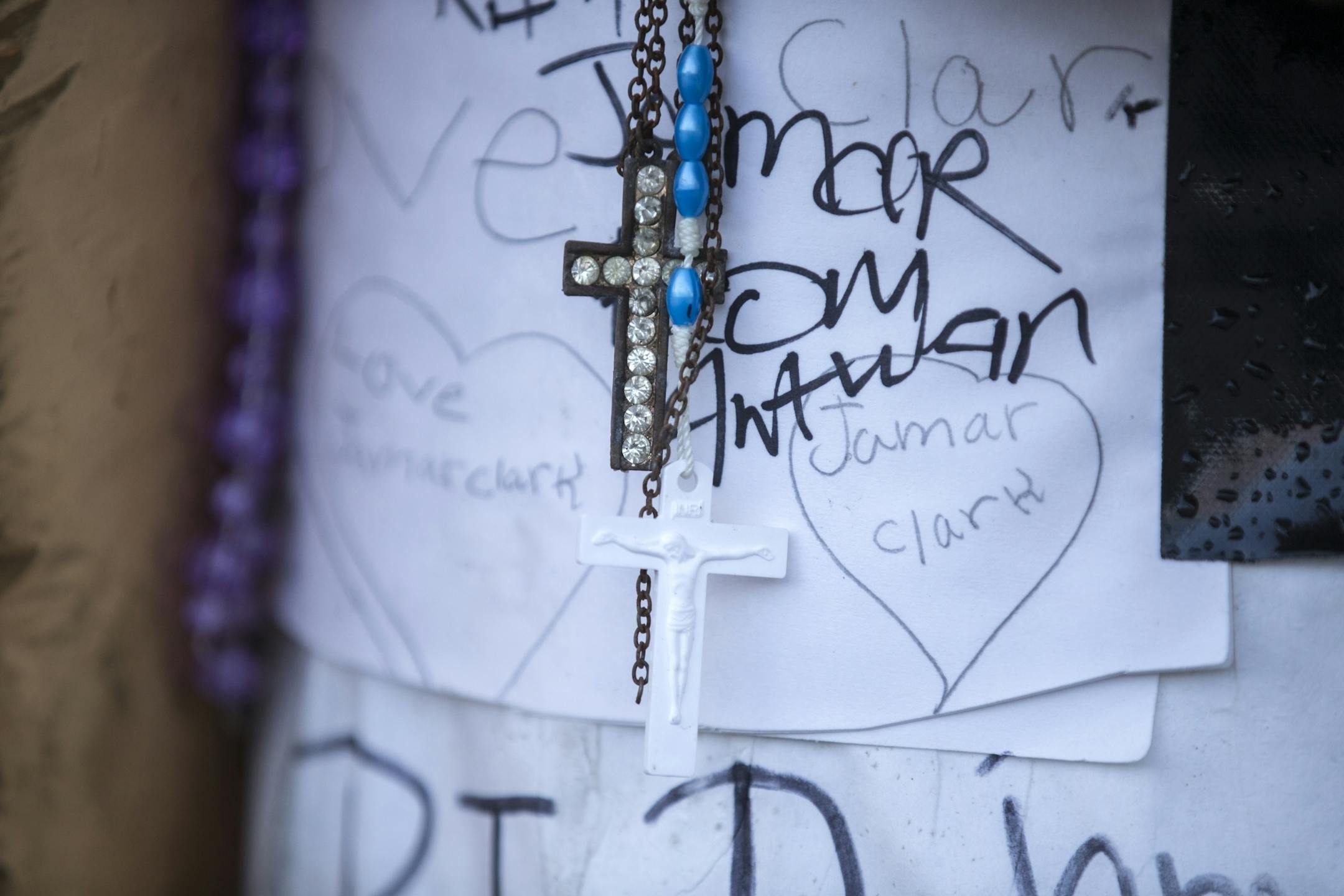 Details of the memorial for Jamar Clark on Plymouth Avenue in the early morning.