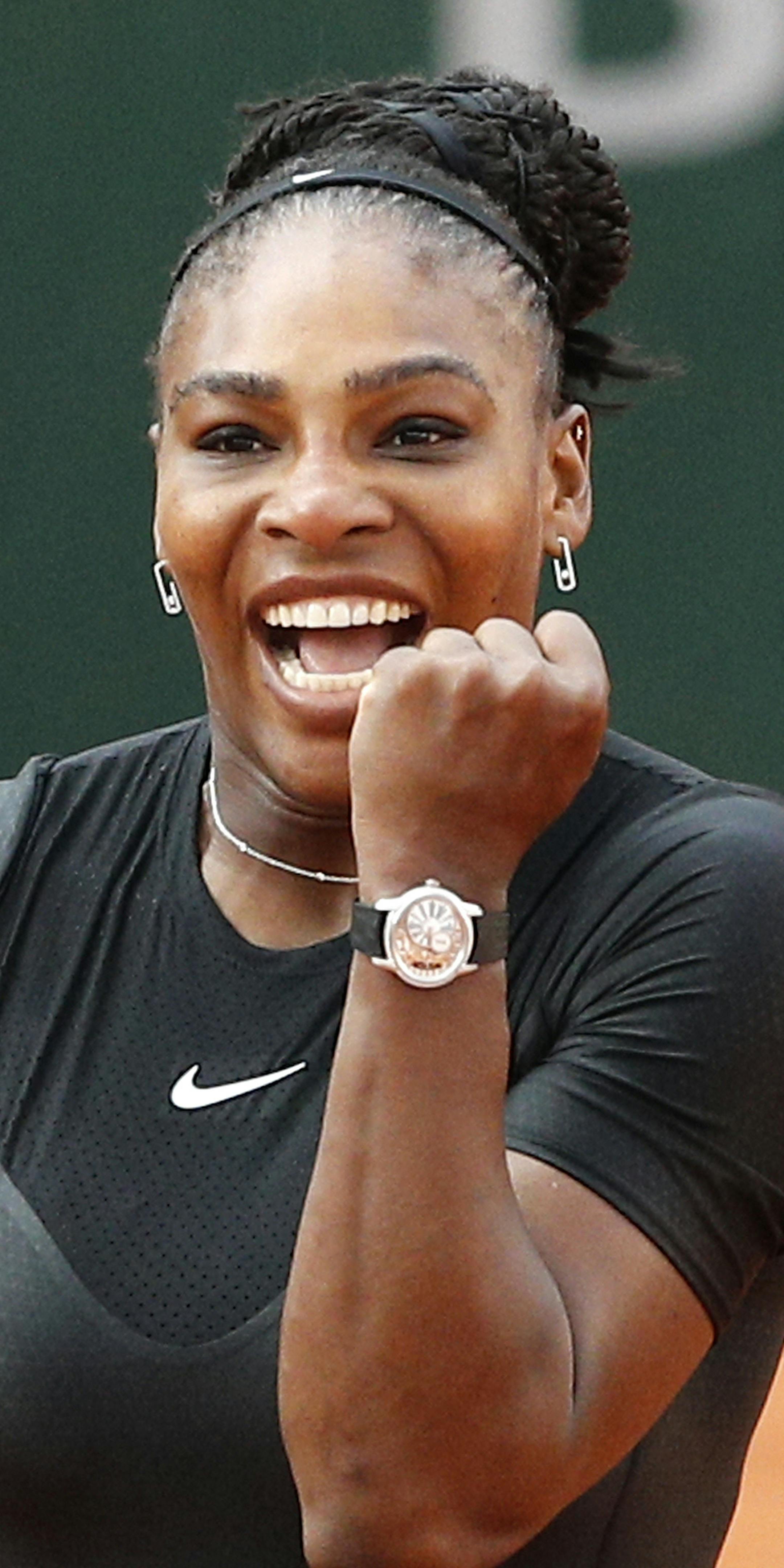 Serena Williams of the U.S. celebrates as she defeats Germany's Julia Georges during their third round match of the French Open tennis tournament at the Roland Garros stadium, Saturday, June 2, 2018 in Paris. (AP Photo/Christophe Ena)