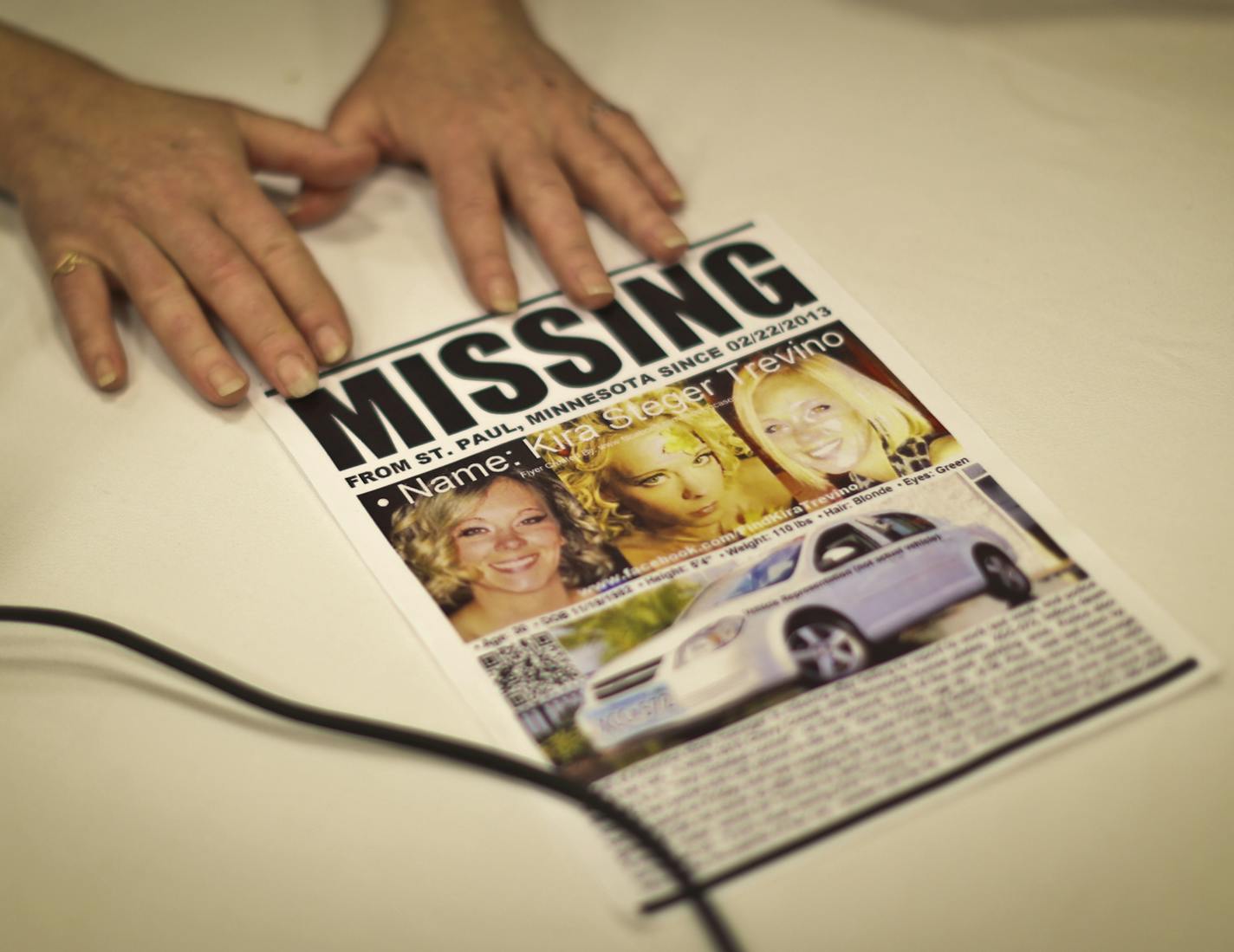 Marcie Steger put her hands on her daughter Kira Tevino's missing person poster as she emphasized that her family's main concern is finding Kiro, as she spoke with family on Wednesday, February 27, 2013, at their hotel in Bloomington, Minn. ] (RENEE JONES SCHNEIDER * reneejones@startribune.com)