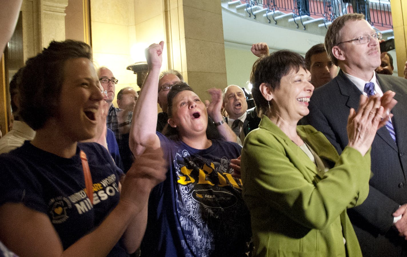 AFSCME and SEIU members cheered Senator Sandy Pappas and Rep. Michael Nelson, co authors of the daycare unionization bill after passage of the bill 68-66 Monday, May 20, 2013 ] GLEN STUBBE * gstubbe@startribune.com