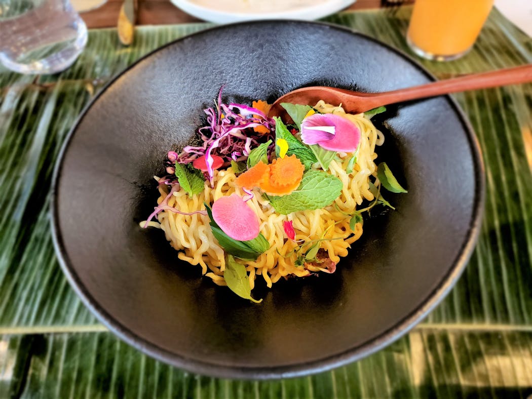Among the dishes at Vinai’s Steady Pour residency is Garden Noodles in a toasted cashew tahini sauce with red curry Bolognese.