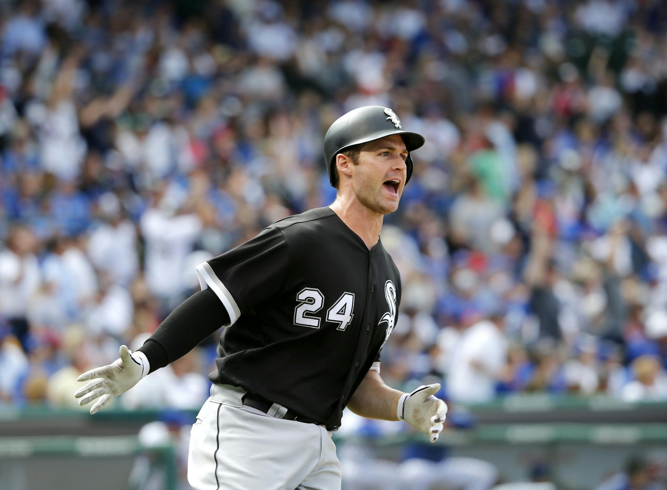 Chicago White Sox's Matt Davidson celebrates down the first base line his home run off Chicago Cubs relief pitcher Koji Uehara during the eighth inning of a baseball game Monday, July 24, 2017, in Chicago. (AP Photo/Charles Rex Arbogast)