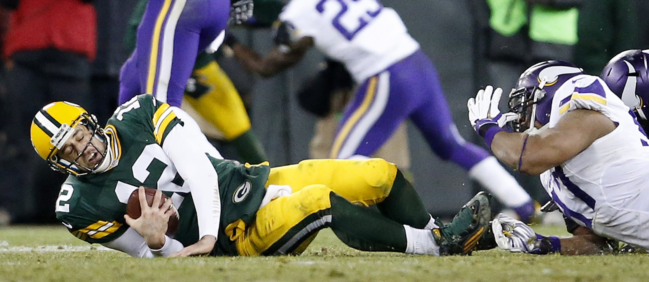 Everson Griffen (97) sacked Aaron Rodgers (12) in the fourth quarter. ] CARLOS GONZALEZ &#xef; cgonzalez@startribune.com - January 3, 2016, Green Bay, WI, Lambeau Field, NFL, Minnesota Vikings vs. Green Bay Packers