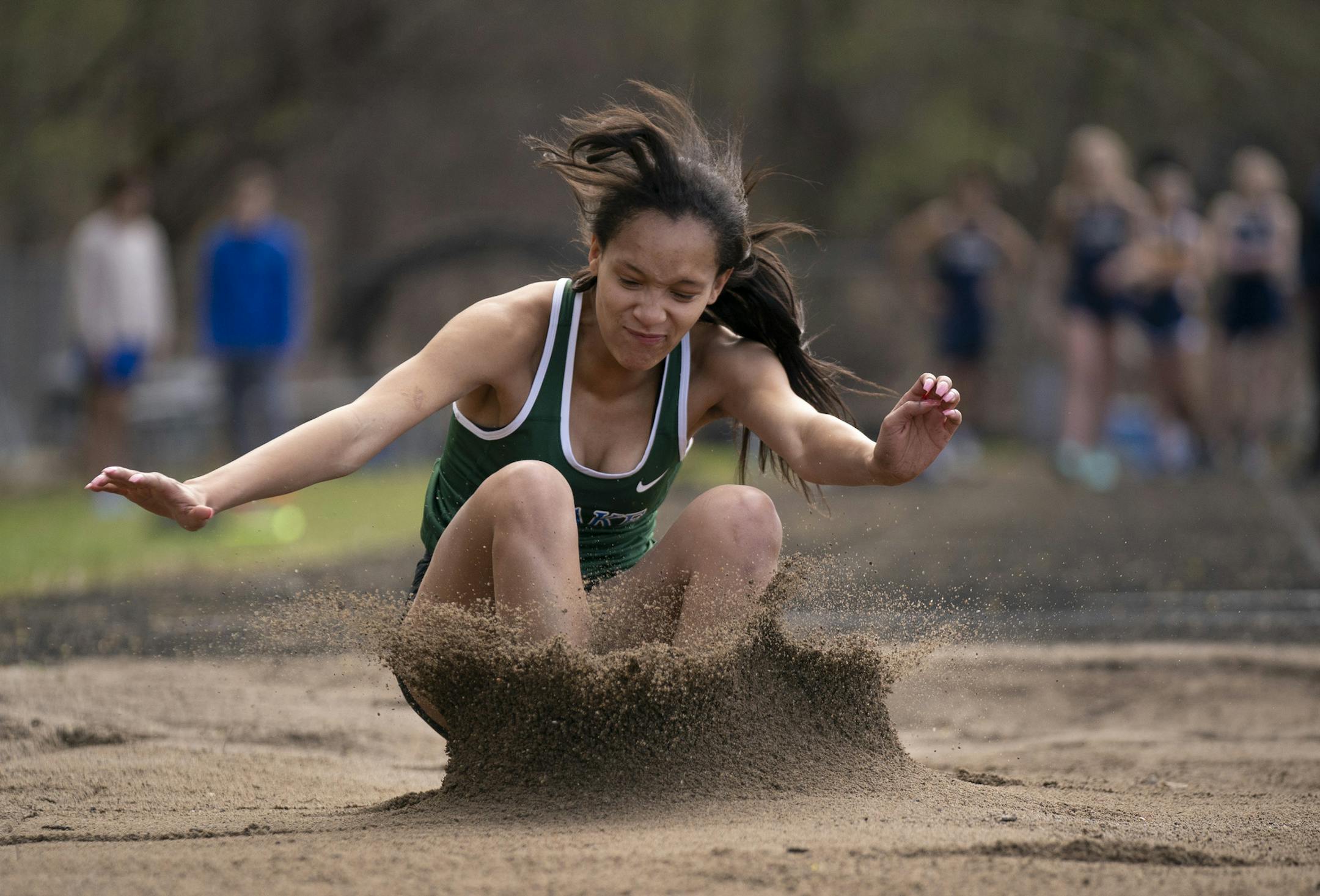 Robbie Grace landed on her third and final jump of a meet on May 2 at The Blake School in Hopkins. Photo: JEFF WHEELER • jeff.wheeler@startribune.com