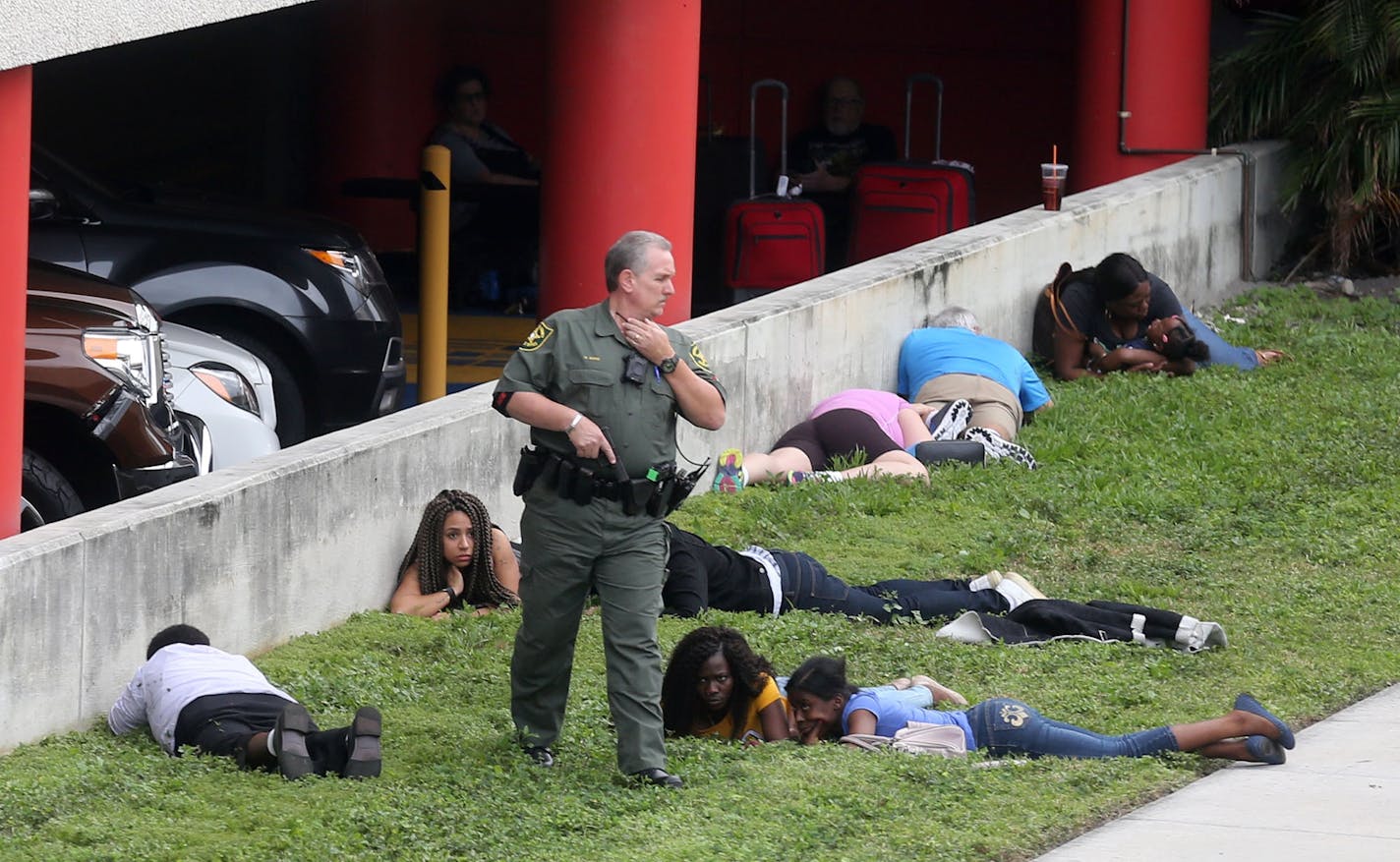 First responders secure the area outside the Fort Lauderdale-Hollywood International airport on Friday, Jan. 6, 2017, in Fort Lauderdale, Fla., after authorities said multiple people died after a lone suspect opened fire at the airport.