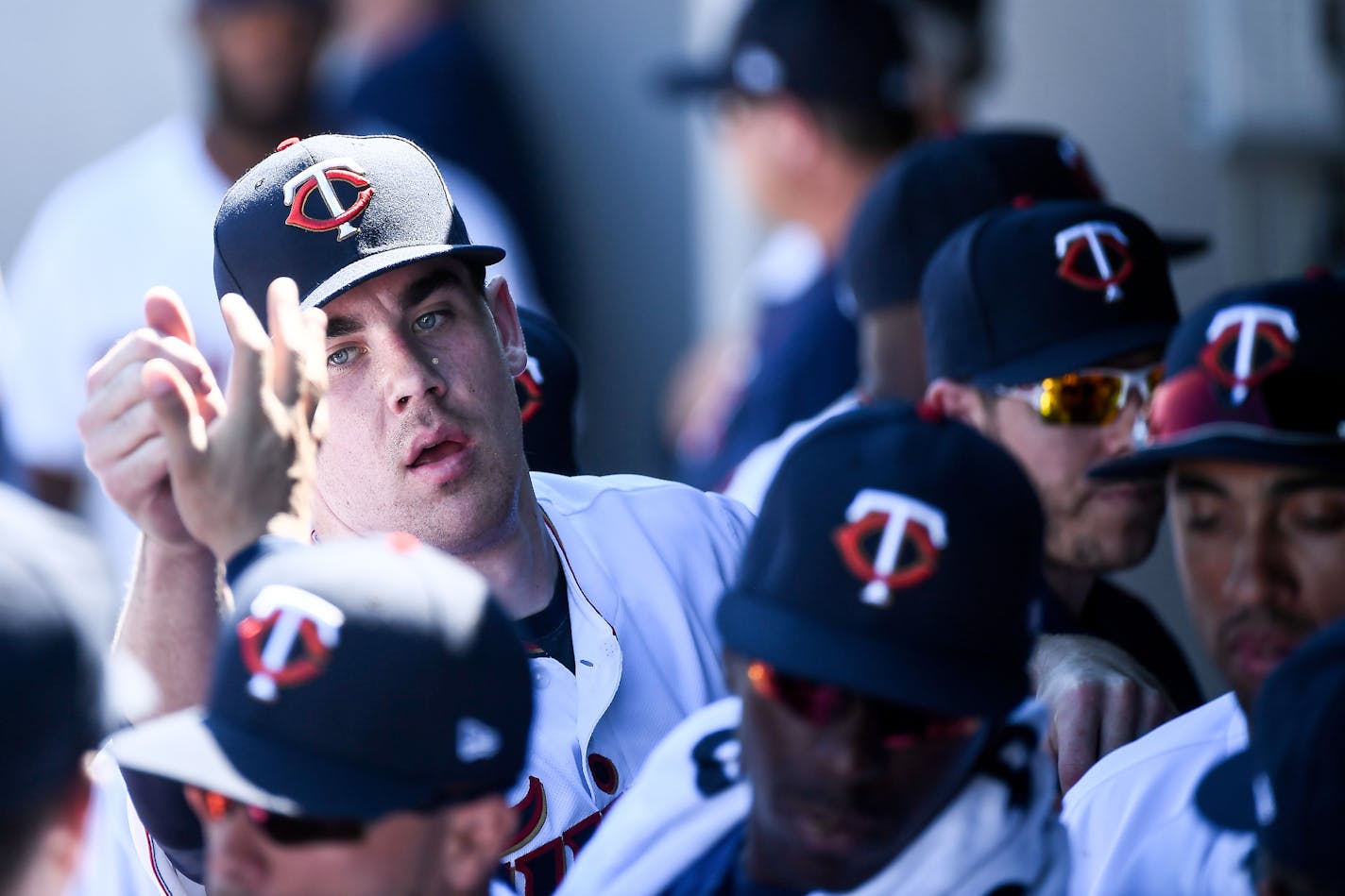 Twins starting pitcher Trevor May high fived teammates after being pulled from the game midway through the second inning Sunday against the Washington Nationals. ] AARON LAVINSKY &#x2022; aaron.lavinsky@startribune.com The Minnesota Twins played the Washington Nationals on Sunday, Feb. 26, 2017 at CenturyLink Sports complex in Fort Myers, Fla.