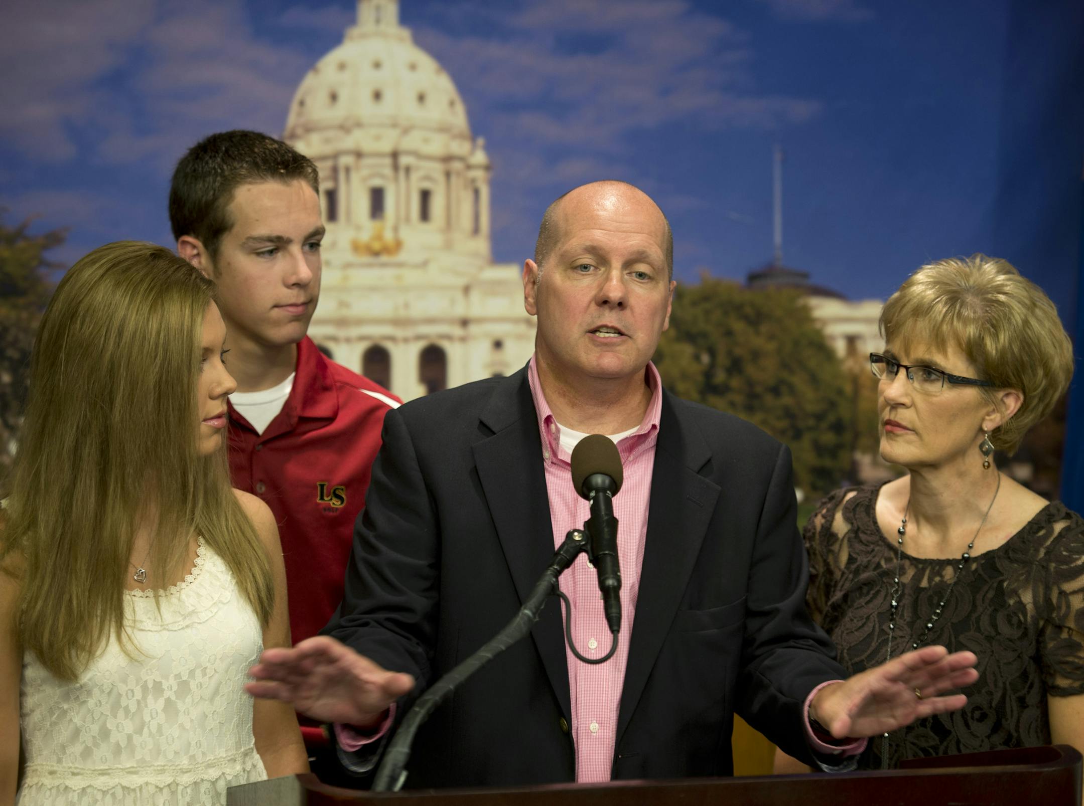 Surrounded by his children Amanda, 20, Phil, 17 and wife of 27 years Rhonda, Lakeville Sen. Dave Thompson announced his gubernatorial run at the Capitol, Wednesday, June 26, 2013.