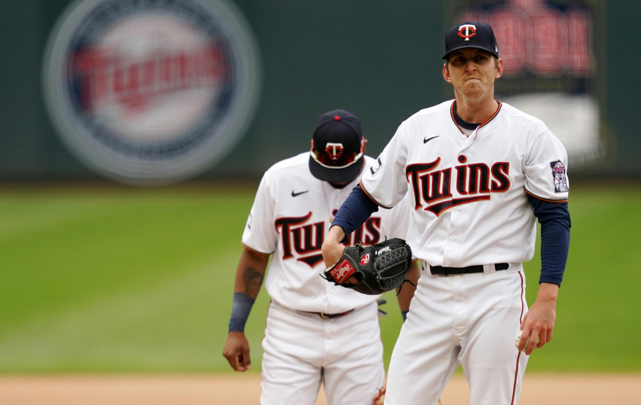 Minnesota Twins relief pitcher Brandon Waddell (58) reacted as Minnesota Twins pitching coach Wes Johnson (47) visited the mound in the sixth inning.