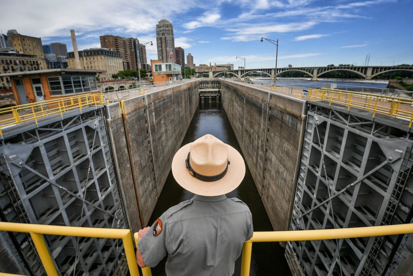 National Park Service superintendent John Anfinson looked out over the lock and dam. The National Park Service is drawing up ambitious plans to provide more public access and to restore the Mississippi River and its waterfront above and below St. Anthony Falls now that Lock & Dam #1 has been turned into a visitor center.