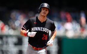 Max Kepler rounds the bases after hitting a home run during the second inning Wednesday against the Nationals in Washington.