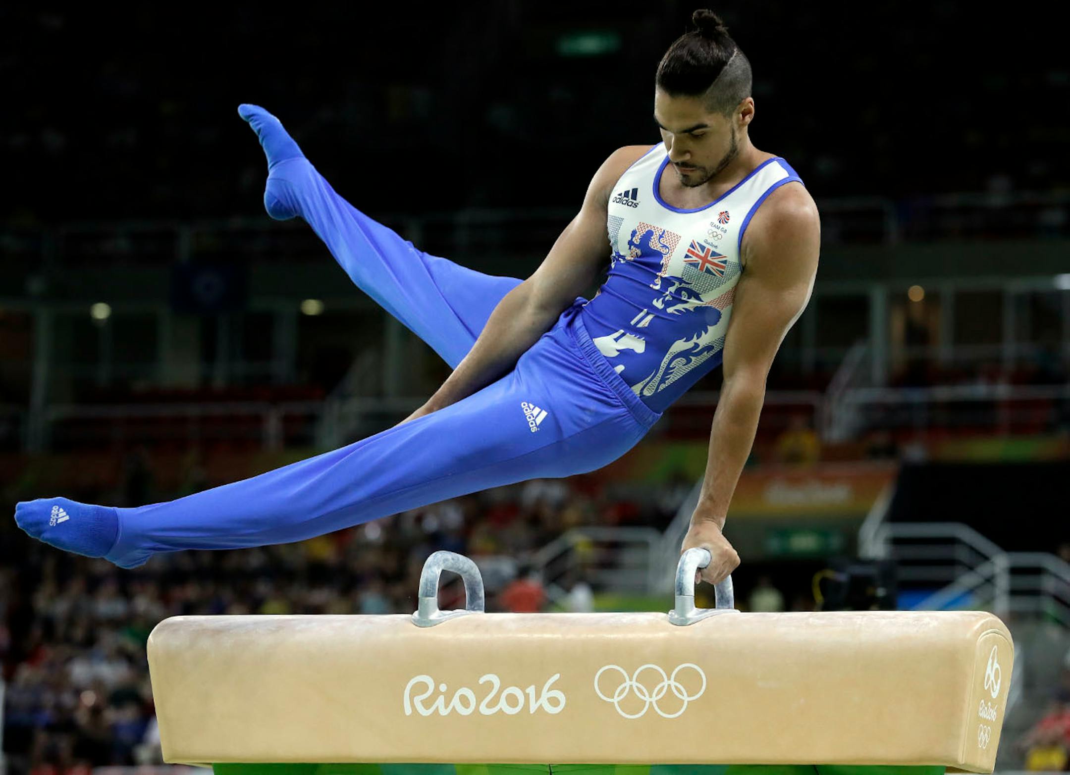 Britain's Louis Smith performs on the pommel horse during the artistic gymnastics men's apparatus final at the 2016 Summer Olympics in Rio de Janeiro, Brazil, Sunday, Aug. 14, 2016.