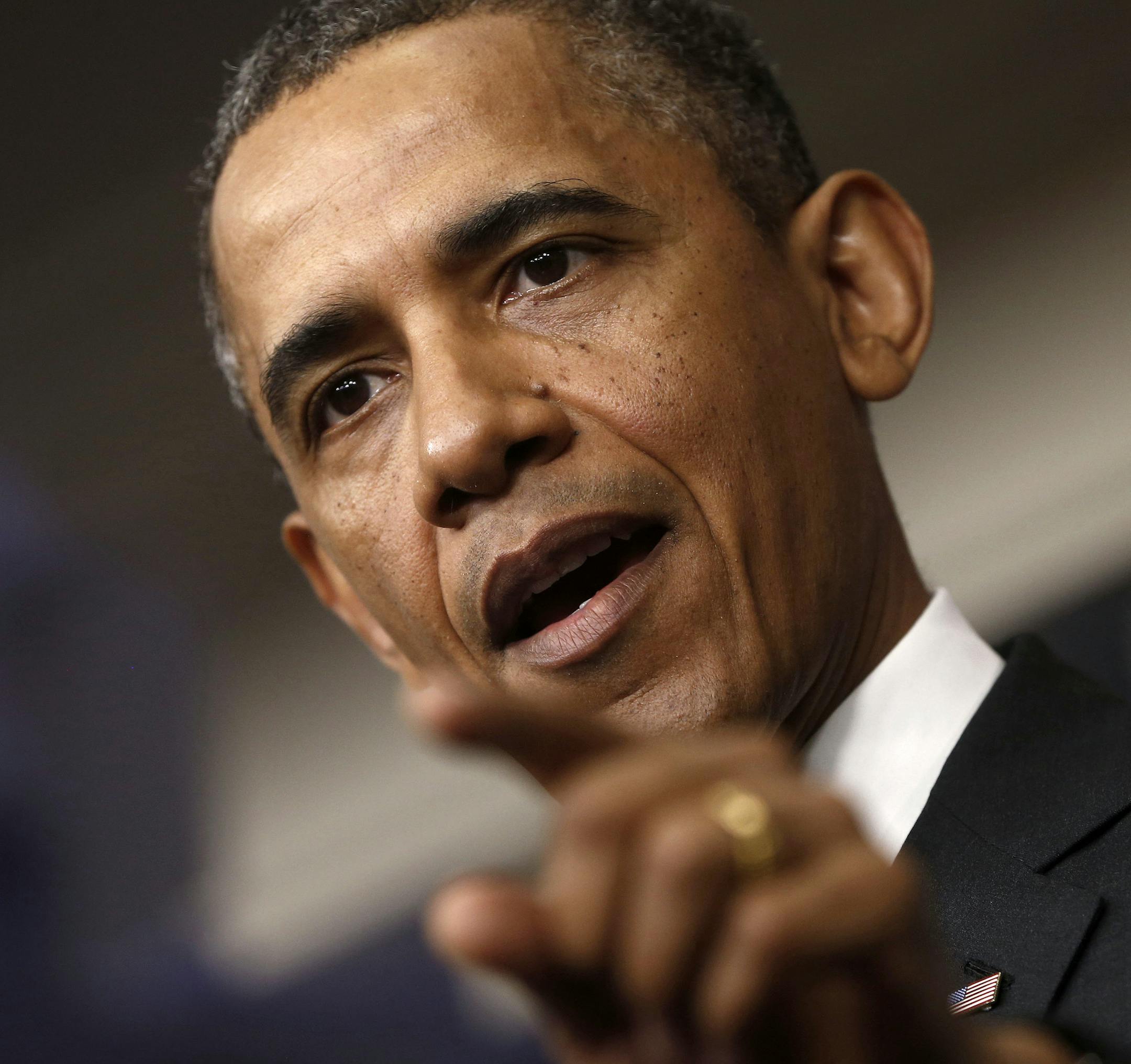 President Barack Obama answers questions during his new conference in the Brady Press Briefing Room of the White House in Washington, Tuesday, April 30, 2013. The president strongly suggested Tuesday he'd consider military action against Syria if it can be confirmed that President Bashar Assad's government used chemical weapons in the two-year-old civil war. (AP Photo/Charles Dharapak)