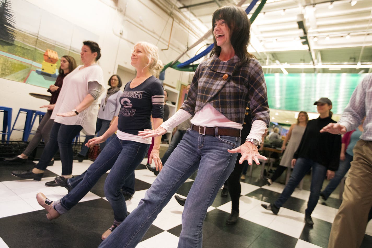 Heidi Heitkamp of St. Paul dances during Tappy Hour. ] LEILA NAVIDI &#xef; leila.navidi@startribune.com BACKGROUND INFORMATION: Tap dance instructor Ellen Keane leads Tappy Hour on the dance floor of the Can Can Wonderland venue in St. Paul on Friday, November 17, 2017.