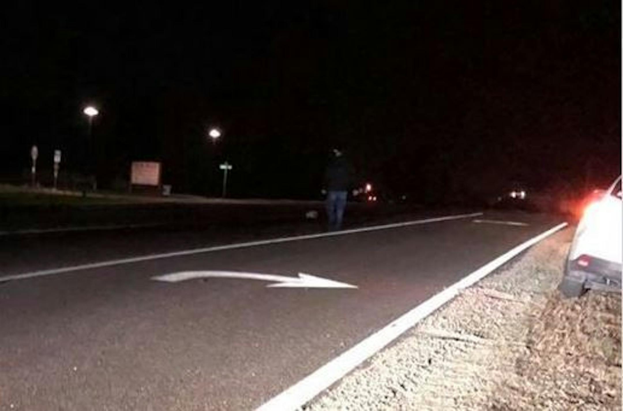 Darren Rust seen removing a boulder from the road in Lakeville.