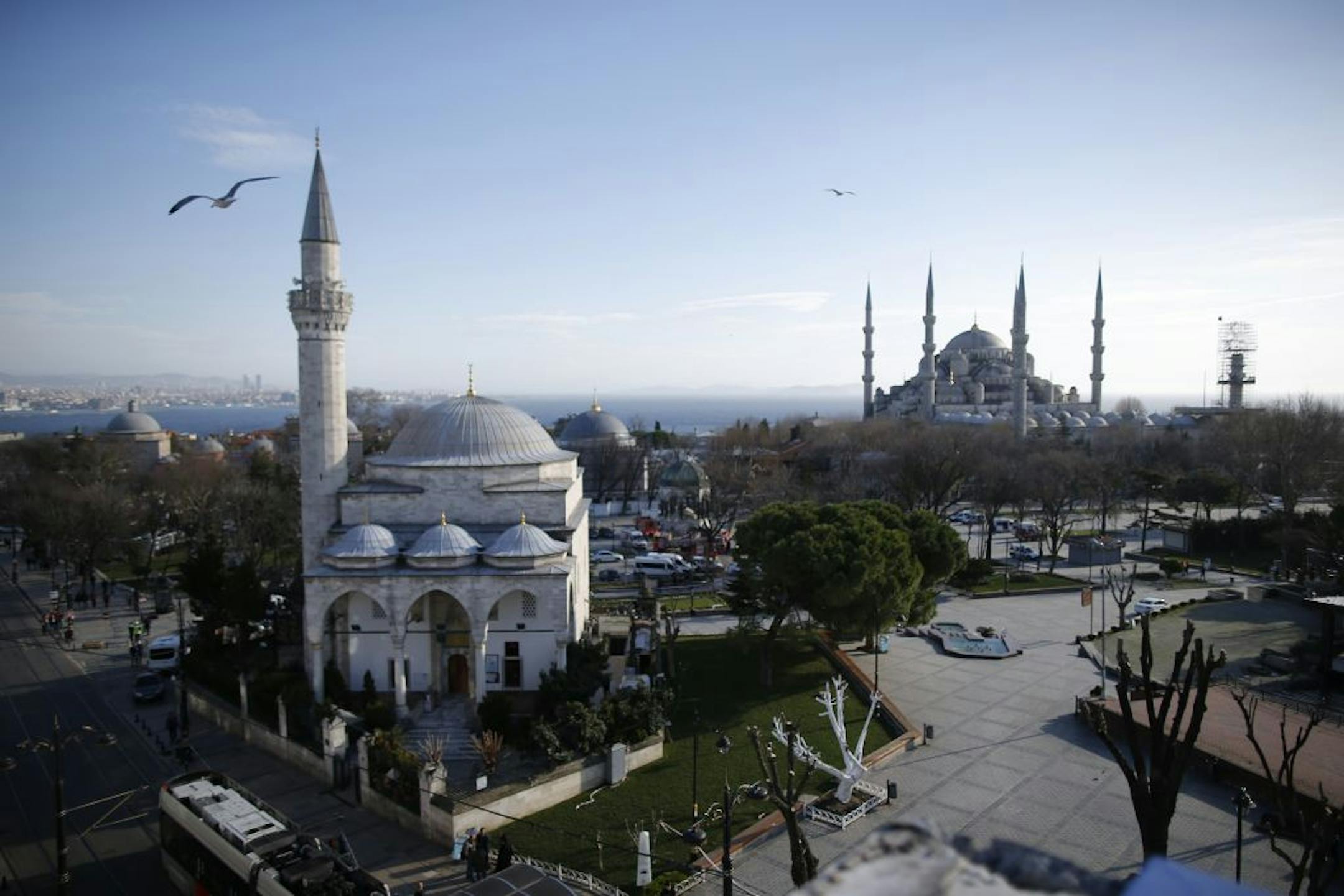 A view of the Sultan Ahmed Mosque, right, better known as the Blue Mosque in the historic Sultanahmet district of Istanbul, the area of an explosion on Jan. 12, 2016. The explosion killed several people and wounded 15 others in a historic district of Istanbul popular with tourists.