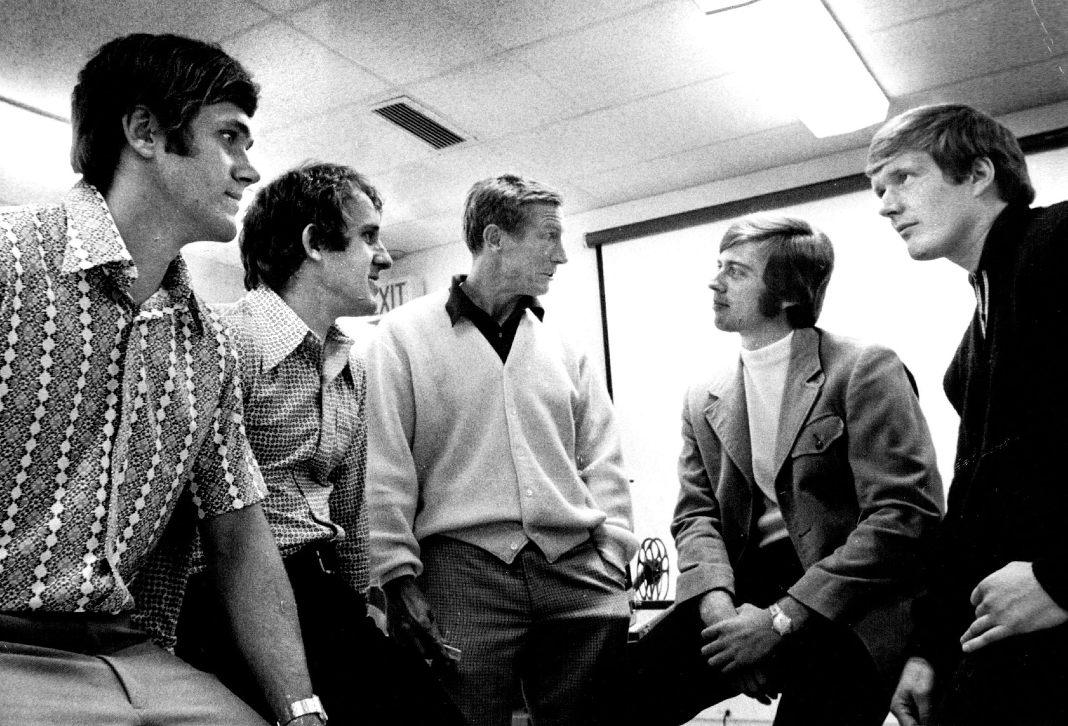 The Minnesota Vikings' four quarterbacks met with the coaching staff as part of a three-day briefing session on May 30, 1972. From left are Neil Graff, Fran Tarkenton, offensive coordinator Jerry Burns, Bob Lee and Jerry Trooien.