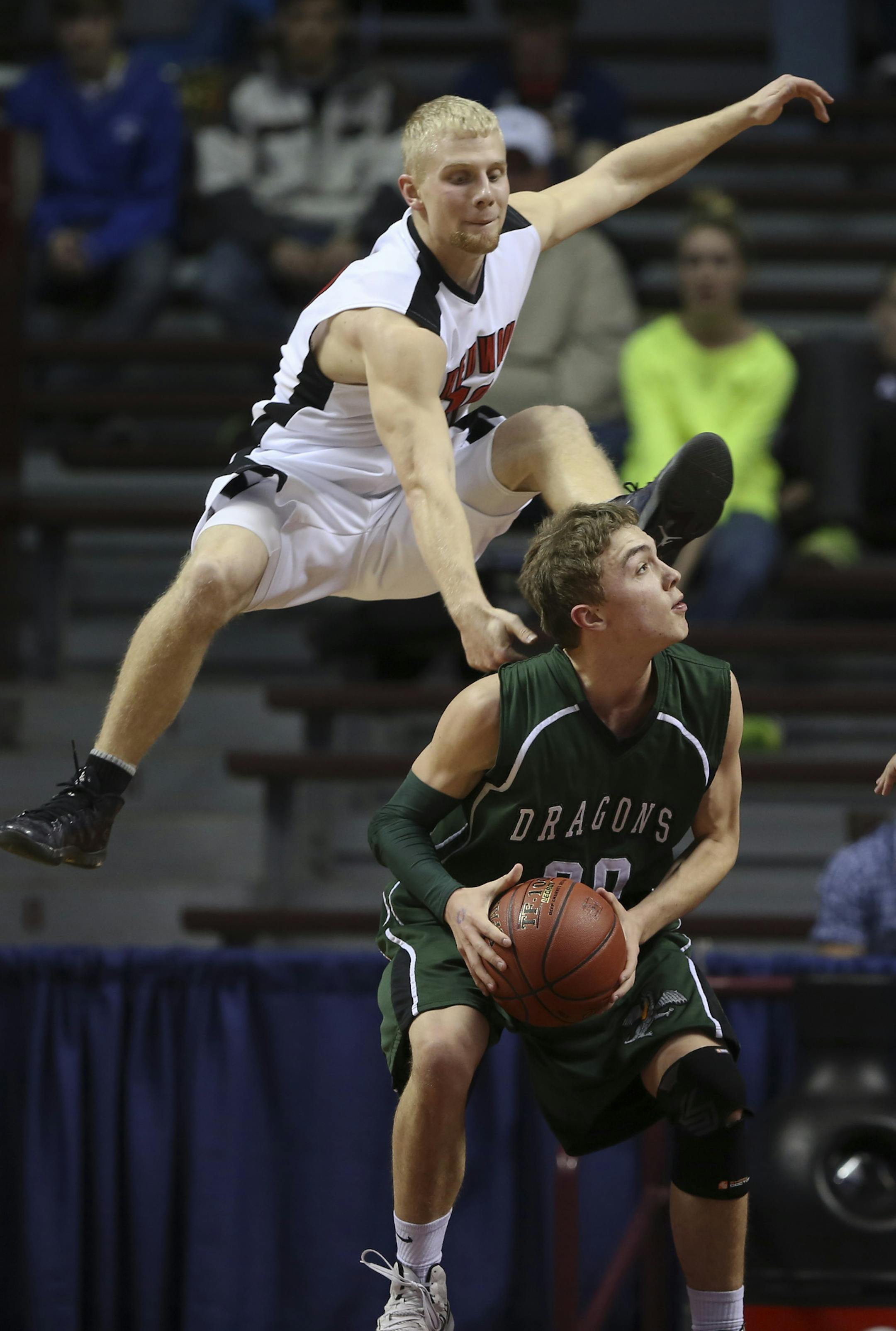 Litchfield and Redwood Valley, Redwood Falls met in the Class 2A Boys' Basketball State Tournament quarterfinal game Wednesday night, March 20, 2013 at Williams Arena in Minneapolis. Redwood Valley, Redwood Falls' Jordan Ford went high to defend Litchfield's Zach Kinny in the first half . ] JEFF WHEELER ‚Ä¢ jeff.wheeler@startribune.com