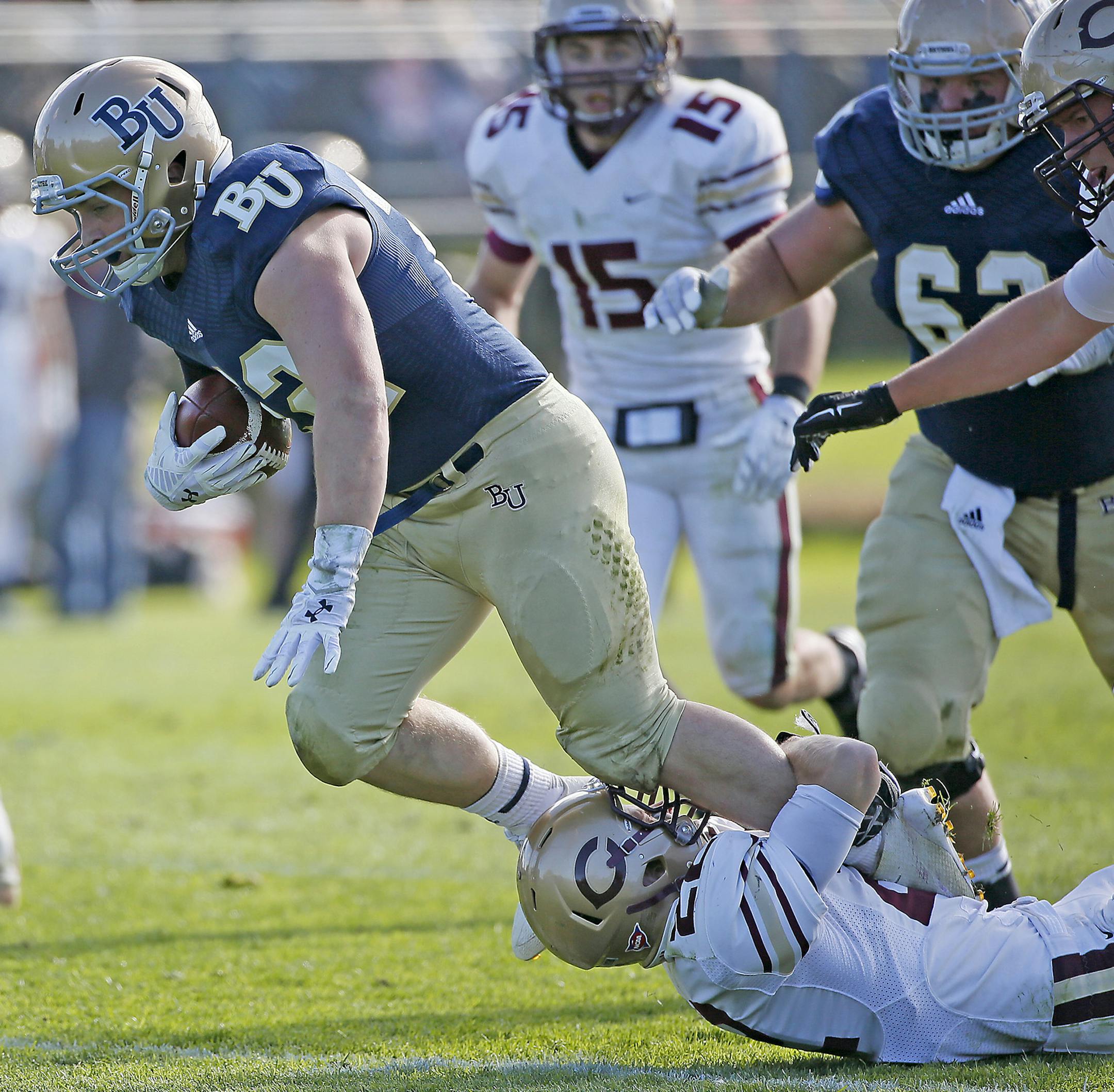 Bethel's Brandon Marquardt Sr., is cought short of the goal line by Concordia's Tyler Hansen in the fourth quarter as they took on Concordia, Saturday, October 4, 2014 at Bethel University in Arden Hills, MN. ] (ELIZABETH FLORES/STAR TRIBUNE) ELIZABETH FLORES • eflores@startribune.com