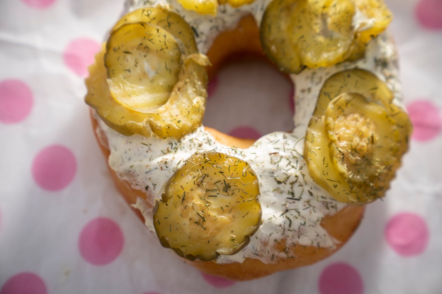 Dill Pickle Donut from Fluffy's Hand-Cut Donuts. The new foods of the 2023 Minnesota State Fair photographed on the first day of the fair in Falcon Heights, Minn. on Tuesday, Aug. 8, 2023. ] LEILA NAVIDI • leila.navidi@startribune.com