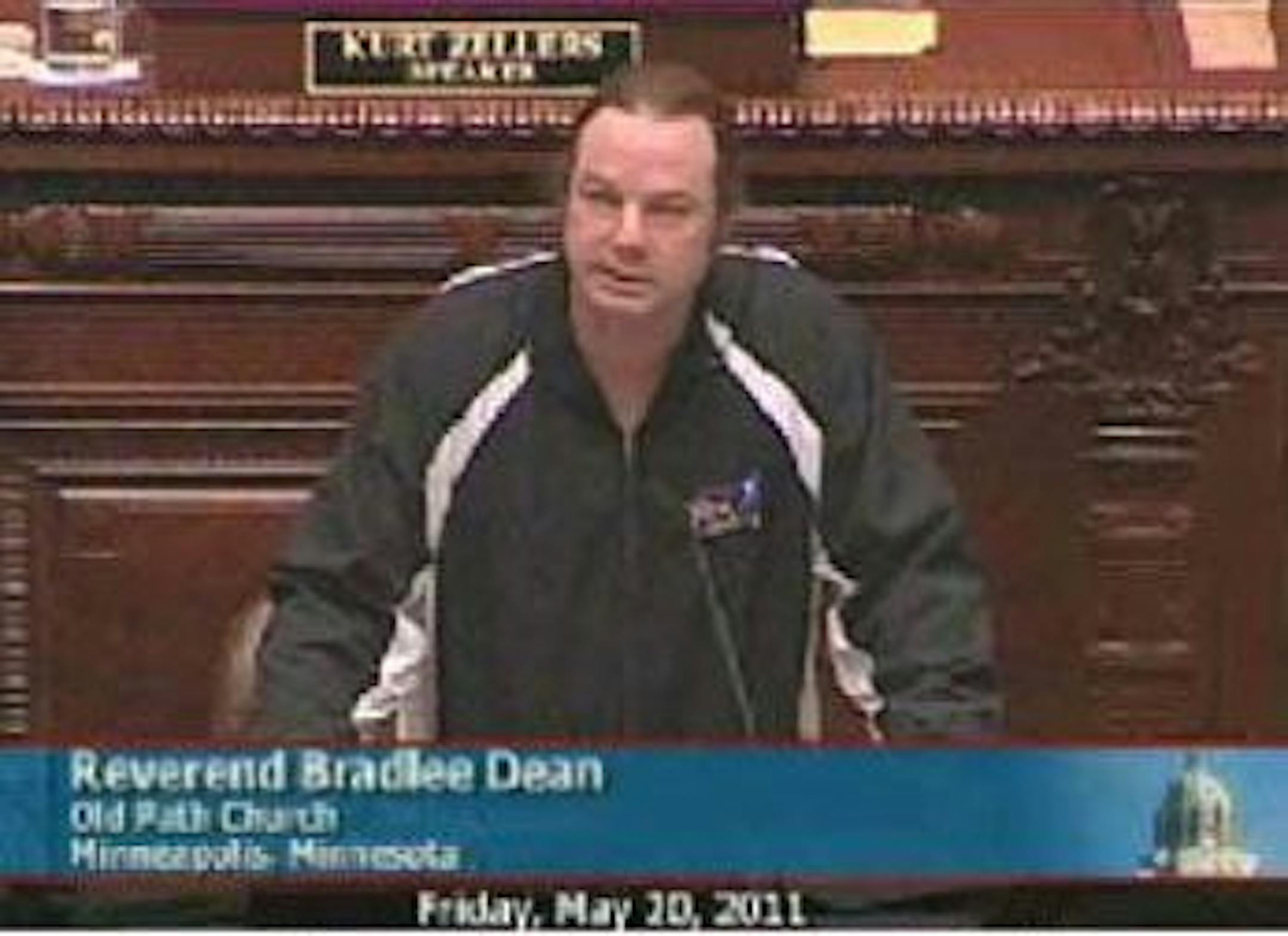 As protesters chanted against an anti-gay marriage amendment outside the House chamber Friday morning, controversial pastor Bradlee Dean took to the House rostrum to give the prayer for the day. Photo credit: from the live streamed video feed of House proceedings.