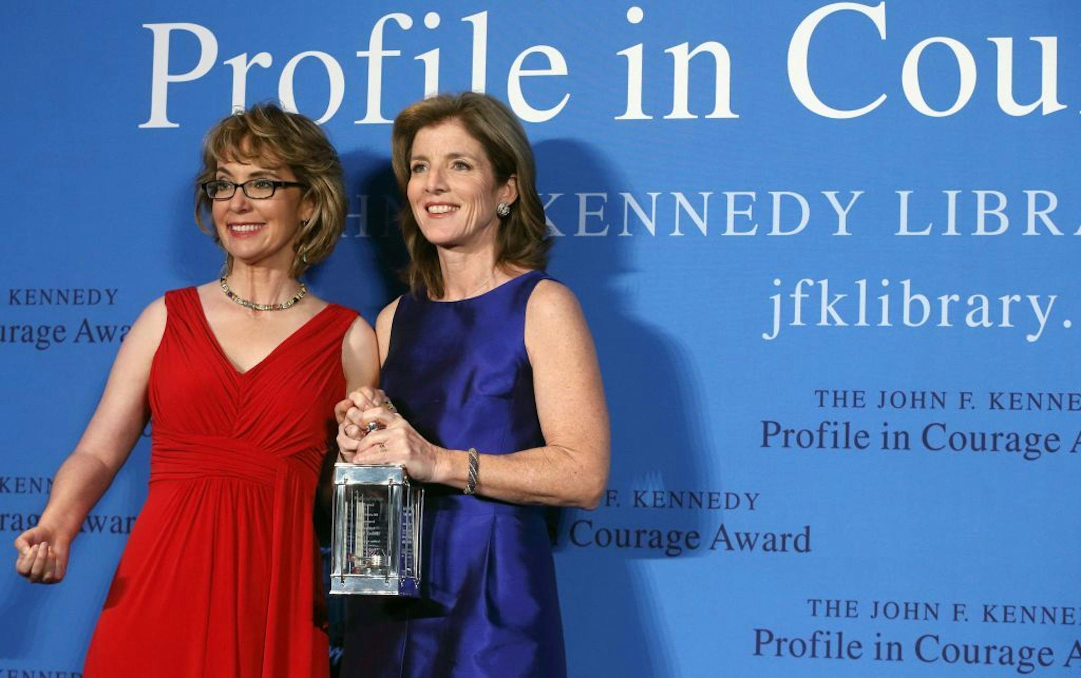 Caroline Kennedy, right, poses with former Arizona congresswoman Gabrielle Giffords after presenting her with the John F. Kennedy Profile in Courage Award at the JFK Library in Boston on May 5, 2013.