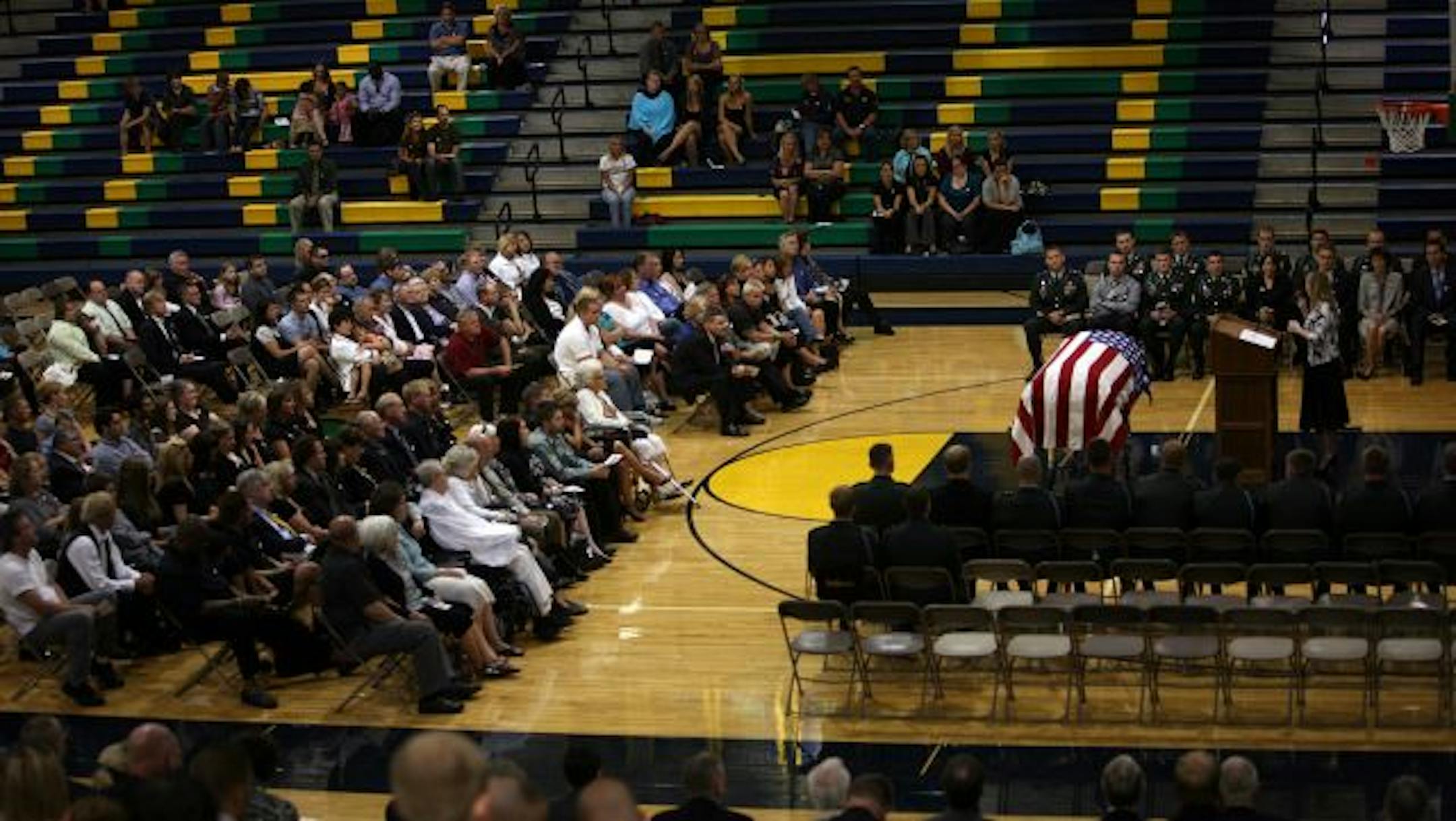 Alison Scot performed a song during the funeral for Corporal Benjamin Kopp held at Rosemount High School.