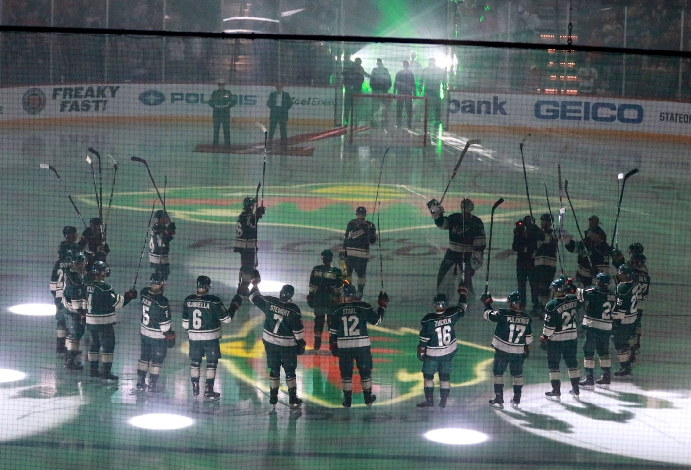 Wild players raise their sticks before the first puck was dropped for the season opener vs. Winnipeg at the Xcel Energy Center Saturday, Oct. 14, 2016, in St. Paul, MN.