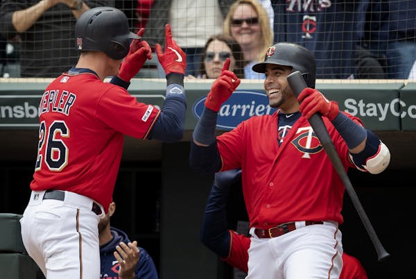 Minnesota Twins Max Kepler and Nelson Cruz celebrated a solo home run by Kepler in the first inning.