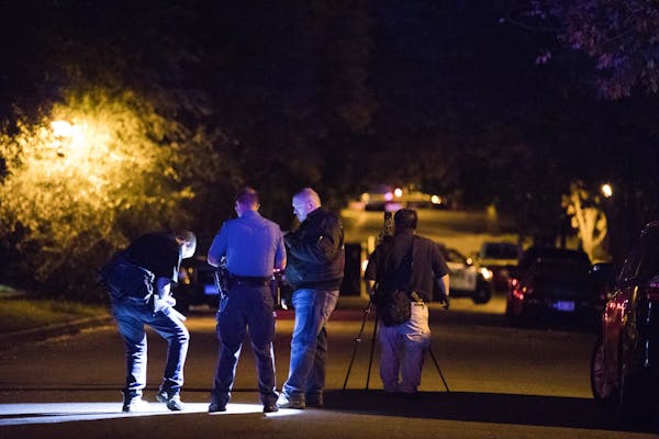 St. Paul Police and the Minnesota BCA investigate an officer involved shooting crime scene on Euclid Street.
