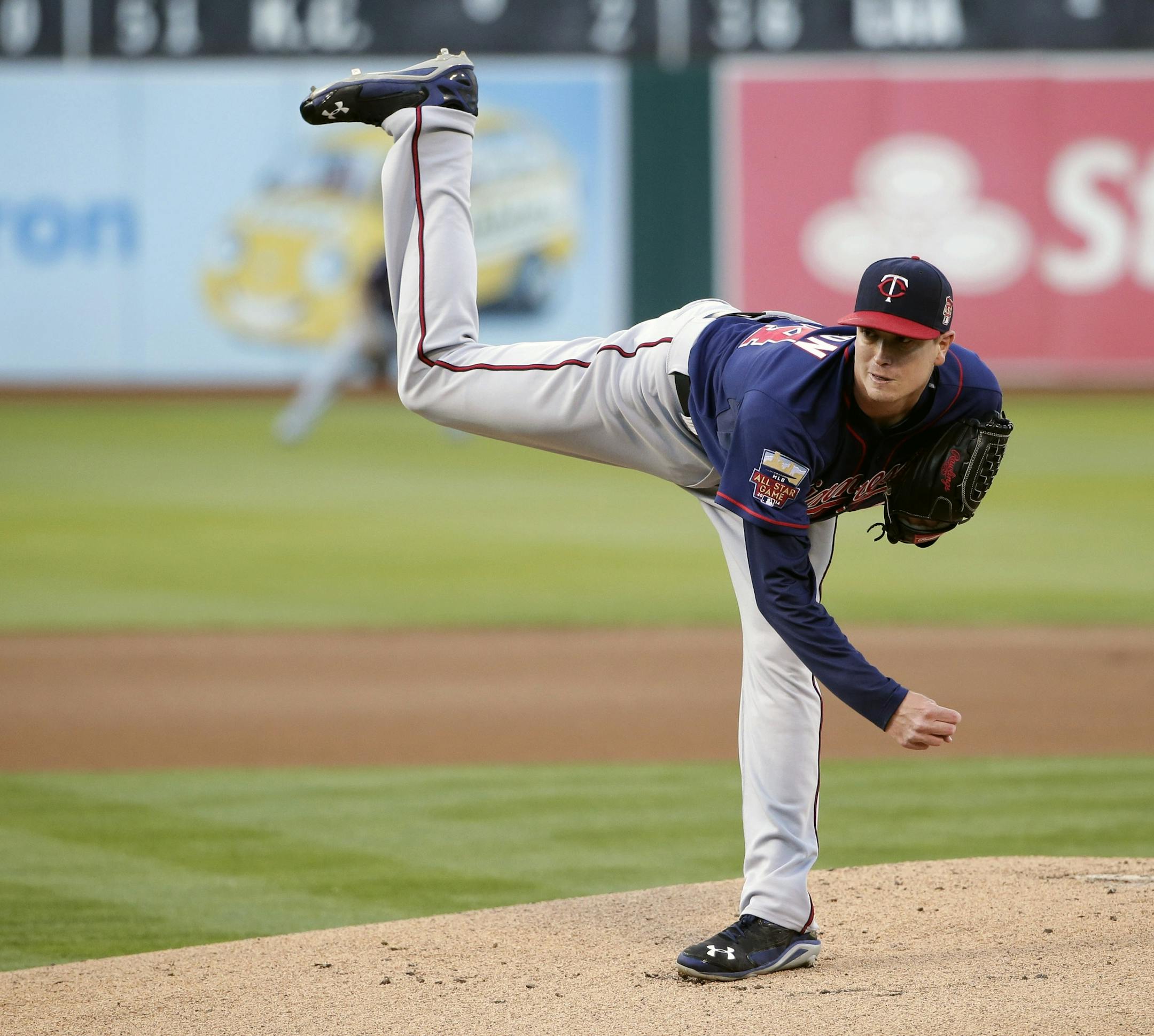 Minnesota Twins starting pitcher Kyle Gibson (44) throws to the Oakland Athletics during the first inning of a baseball game on Friday, Aug. 8, 2014, in Oakland, Calif. (AP Photo/Marcio Jose Sanchez)