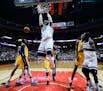 Minnesota Timberwolves forward Taj Gibson (67) yelled as he dunked the ball in the fourth quarter against the Los Angeles Lakers. ] AARON LAVINSKY &#x