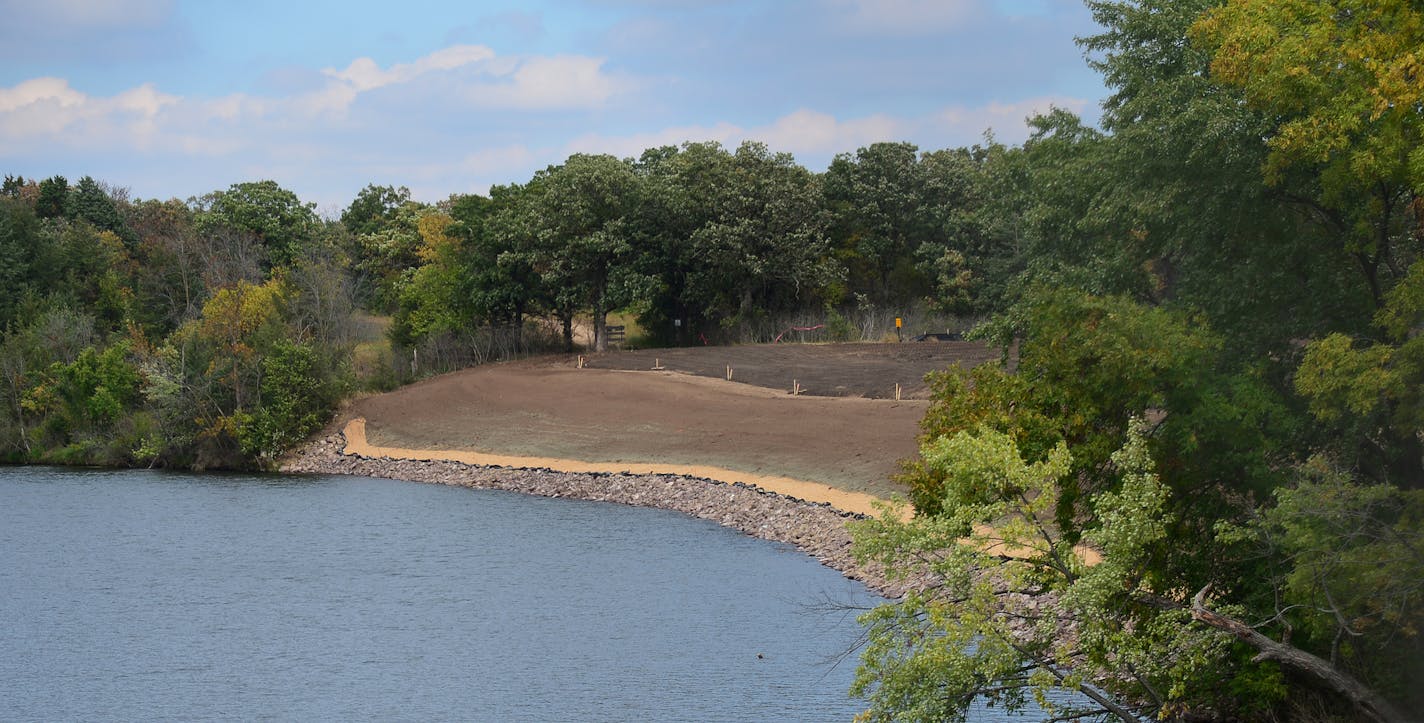 This is the view of the West bank of Rum River, just north of Bunker Lake Blvd in Anoka, Minn. Hundreds of pines, oaks and other trees and shrubs will be planted this fall on the cleared, 700-foot long bank. About 2,000 willow shoots will be inserted amidst the rock rip-rap strip along the bank's edge on the river. ] Richard.Sennott@startribune.com Richard Sennott/Star Tribune Anoka Minnesota Tuesday 9/17/13) ** (cq)