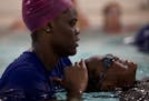 Danyelle Brooks helped guide students at the Blaisdell YMCA in Minneapolis, one of several programs in Minnesota seeking to combat the dangers of swim