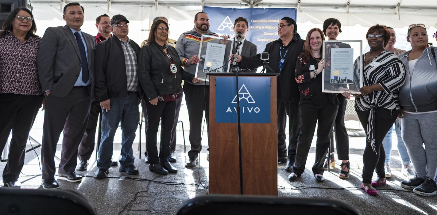 Mayor Jacob Frey(center), and Red Lake Nation Tribal Chairman Darrell G. Seki, Sr.(to his right) came together to celebrate housing 100 people previously using the Navigation Center as the city prepares to close it at the end of May. At AVIVO, Mayor Frey made a proclamation of "Red Lake Nation and Avivo Ending Homelessness Day in the City of Minneapolis." .] RICHARD TSONG-TAATARII &#xa5; richard.tsong-taatarii@startribune.com