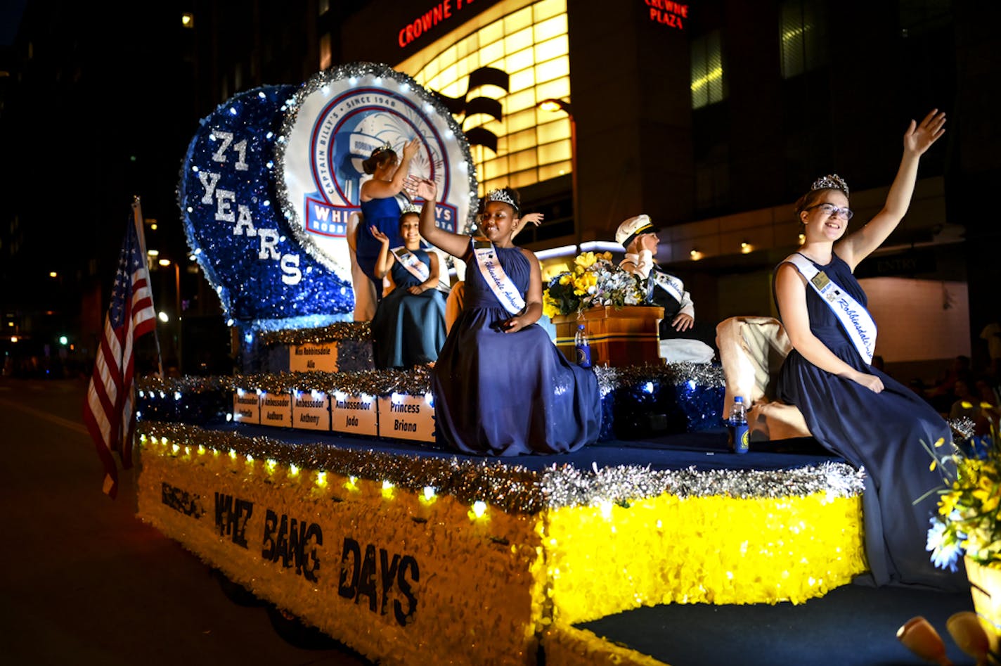 The Robbinsdale Whiz Bang Days royal family took part in the Torchlight Parade Wednesday night. ] Aaron Lavinsky ¥ aaron.lavinsky@startribune.com Aquatennial kicked off with the annual CenterPoint Energy Torchlight Parade on Wednesday, July 24, 2019 in Minneapolis, Minn.