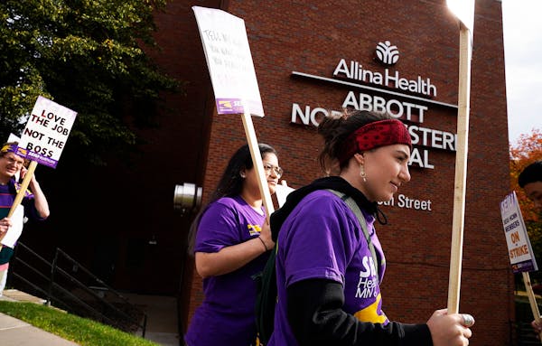 Katie Anderson, front, a senior mental health coordinator at Abbott Northwestern Hospital in Minneapolis, joined colleagues on the picket line Monday 