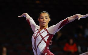 Minnesota's Mya Hooten competes on the balance beam during an NCAA gymnastics earlier this year in Las Vegas.