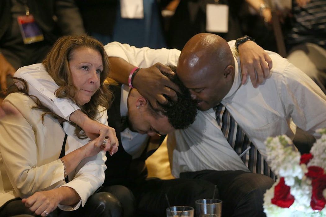 Tyus Jones hugged his parents Debbie and Rob when his name was announced in the 2015 NBA draft.