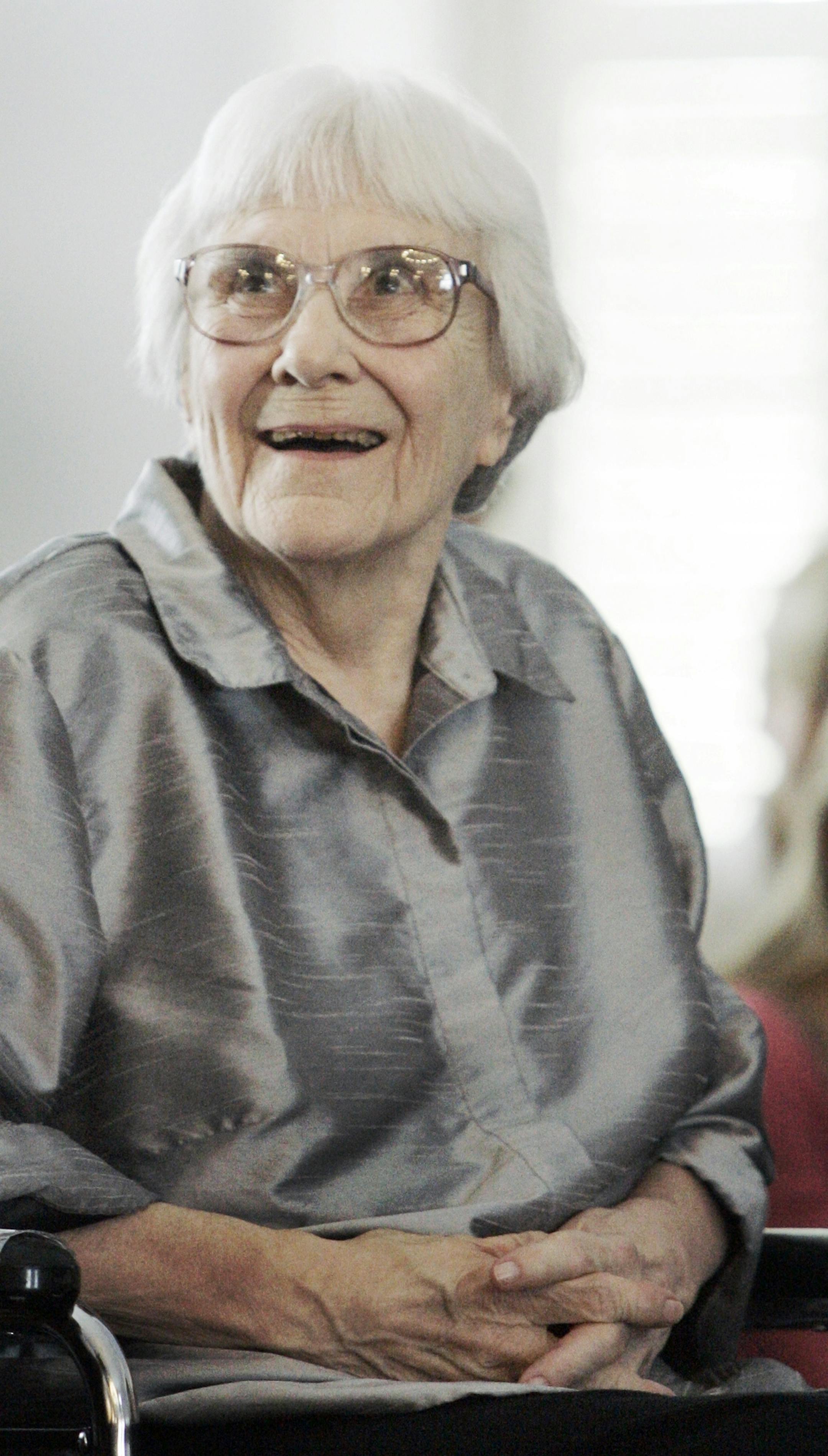 FILE - In this Aug. 20, 2007, file photo, author Harper Lee smiles during a ceremony honoring the four new members of the Alabama Academy of Honor at the Capitol in Montgomery, Ala. "To Kill a Mockingbird" author Harper Lee, 89, is among the inaugural inductees for the Alabama Writers Hall of Fame, Monday, June 8, 2015. (AP Photo/Rob Carr, File)